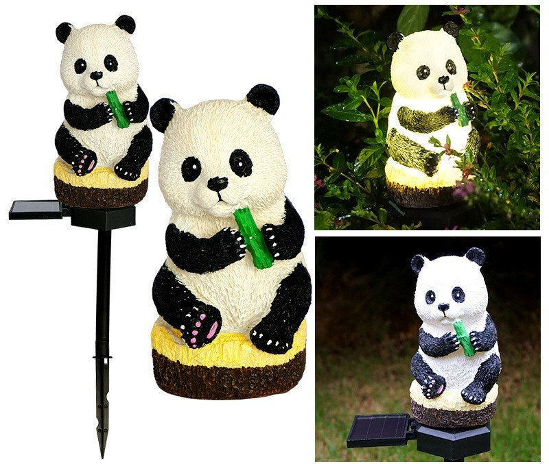 Panda solar stake light with painted resin panda figures and green bamboo detail.