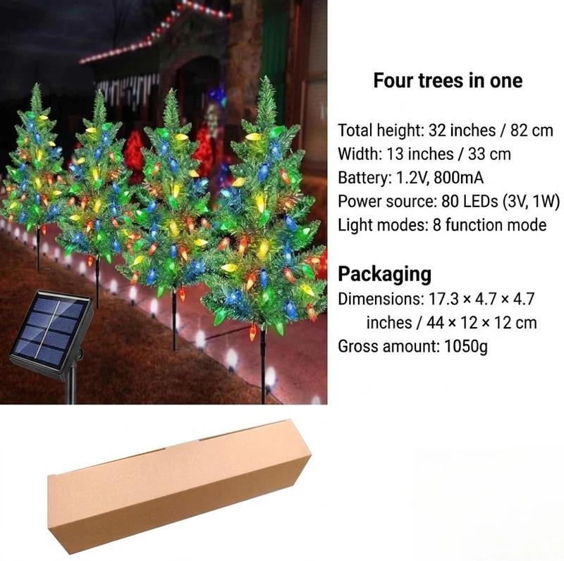 Solar Christmas tree stakes set with four trees and multicolor LED lights on stakes