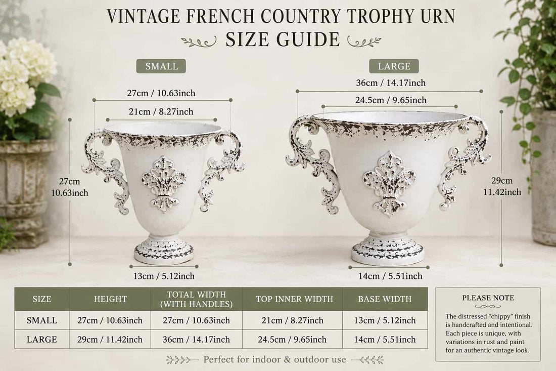 Distressed white trophy urn planter with ornate crest and curled side handles, size variants