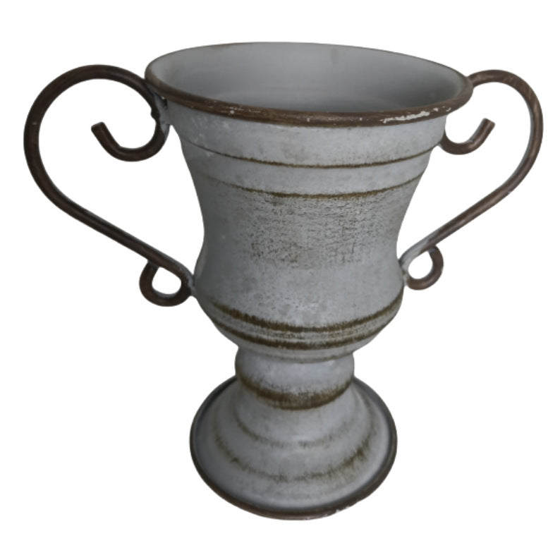 Bring the timeless elegance of a European estate to your home with this Vintage Trophy Planter. 