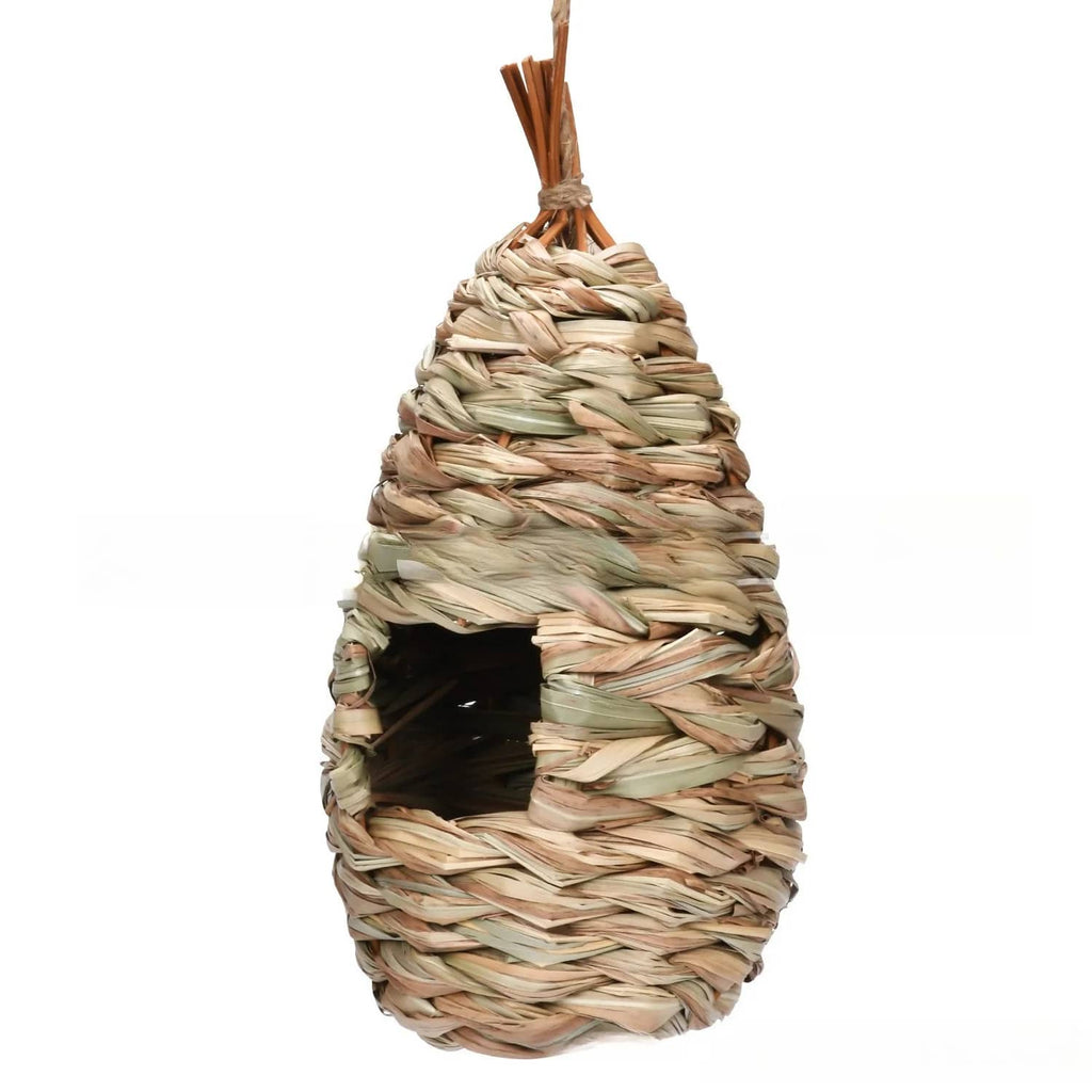 Woven birdhouse made of natural materials on a white background