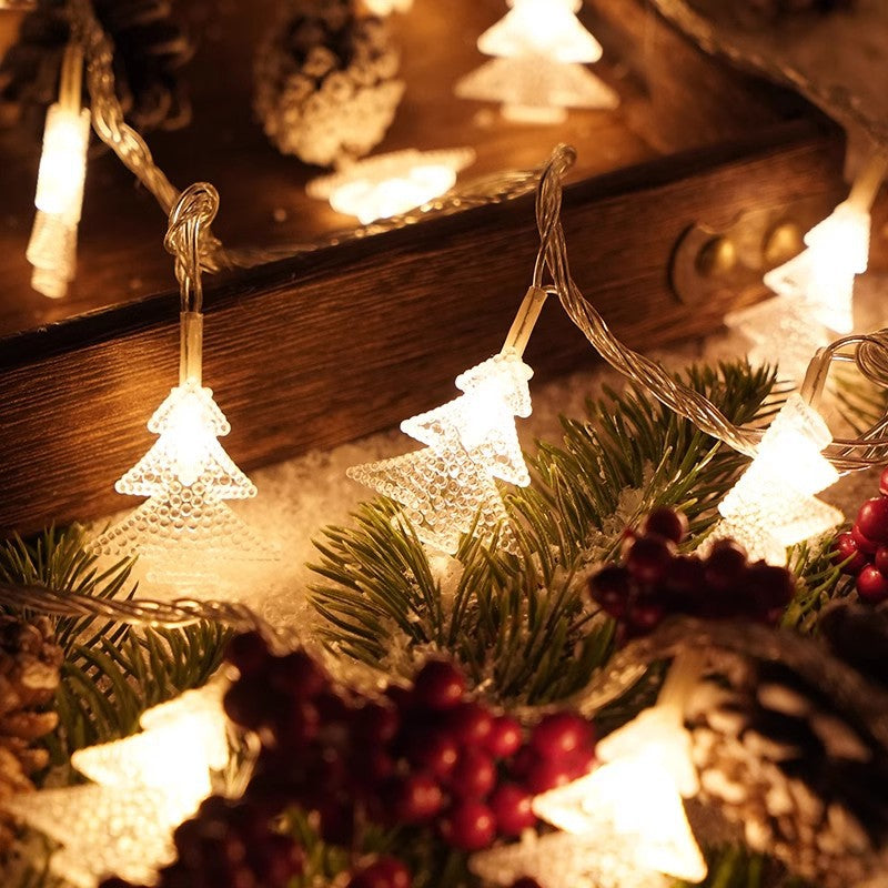 Warm-white LED light string with glowing star-shaped ornaments and small tree charms