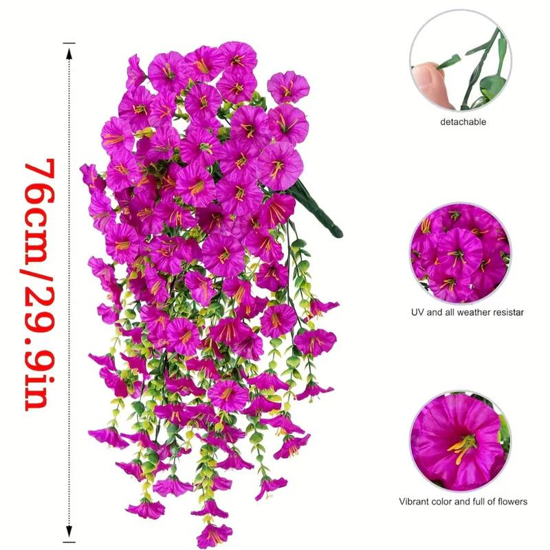 Artificial hanging vine flowers with bright fuchsia-purple blooms and green stems.