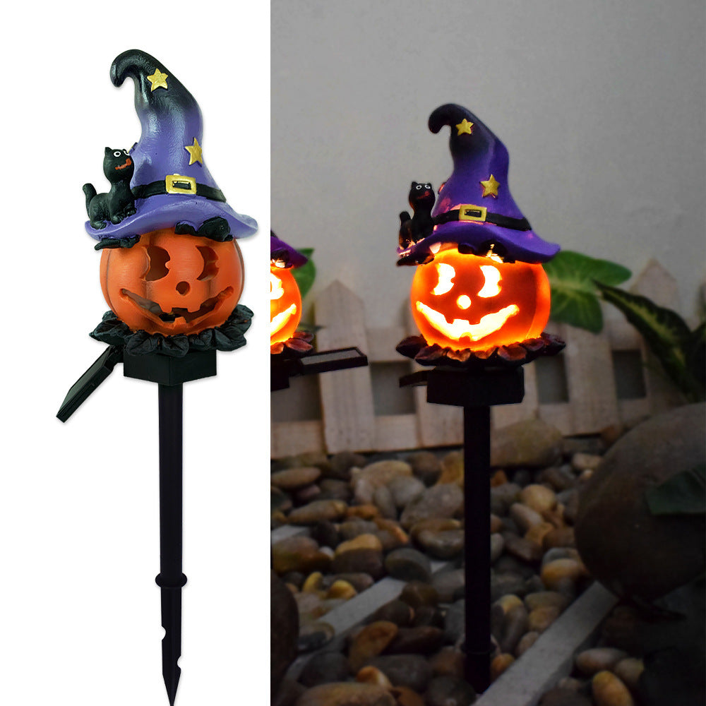 Glödande häxhatt-jack-o-lantern solcellsdriven trädgårdslampa med stjärnkatt-topp