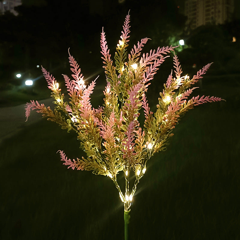 Glowing solar pathway stake light with pink and lavender tips and yellow bulb clusters