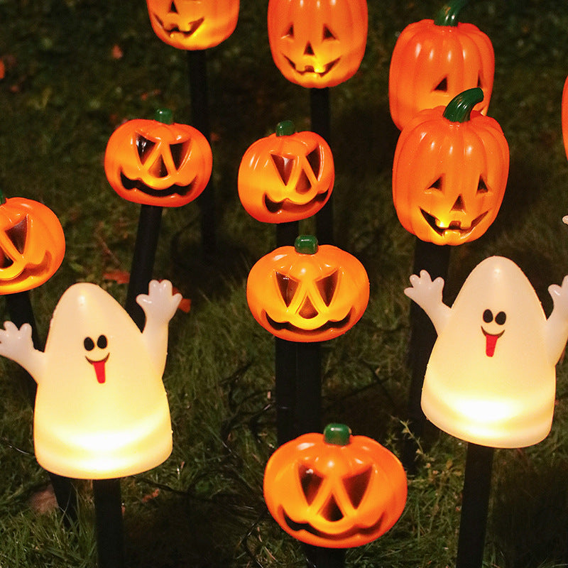 Halloween LED pumpkin and ghost stake lights with glowing faces