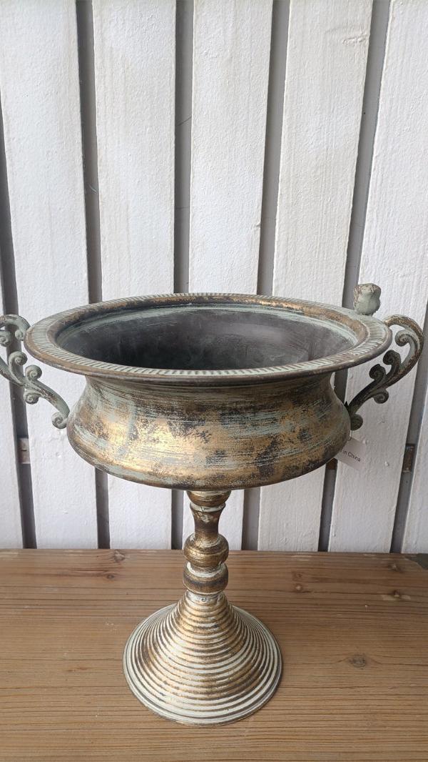 Antique gold pedestal planter urn with side handles and dark inner bowl
