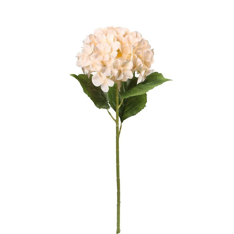 Faux hydrangea flower stem with cream blooms and green leaves