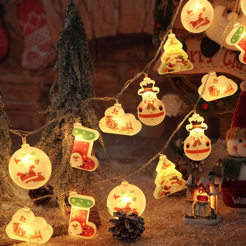 Festive LED string lights with glowing Santa and snowman character bulbs