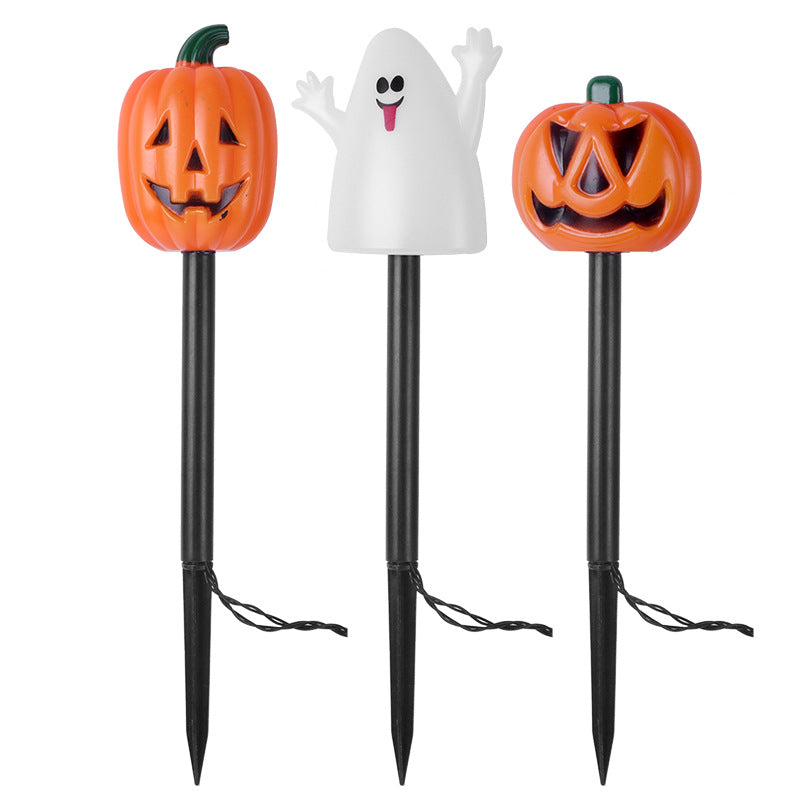 Halloween LED pumpkin and ghost stake lights, three glowing figures on black stakes