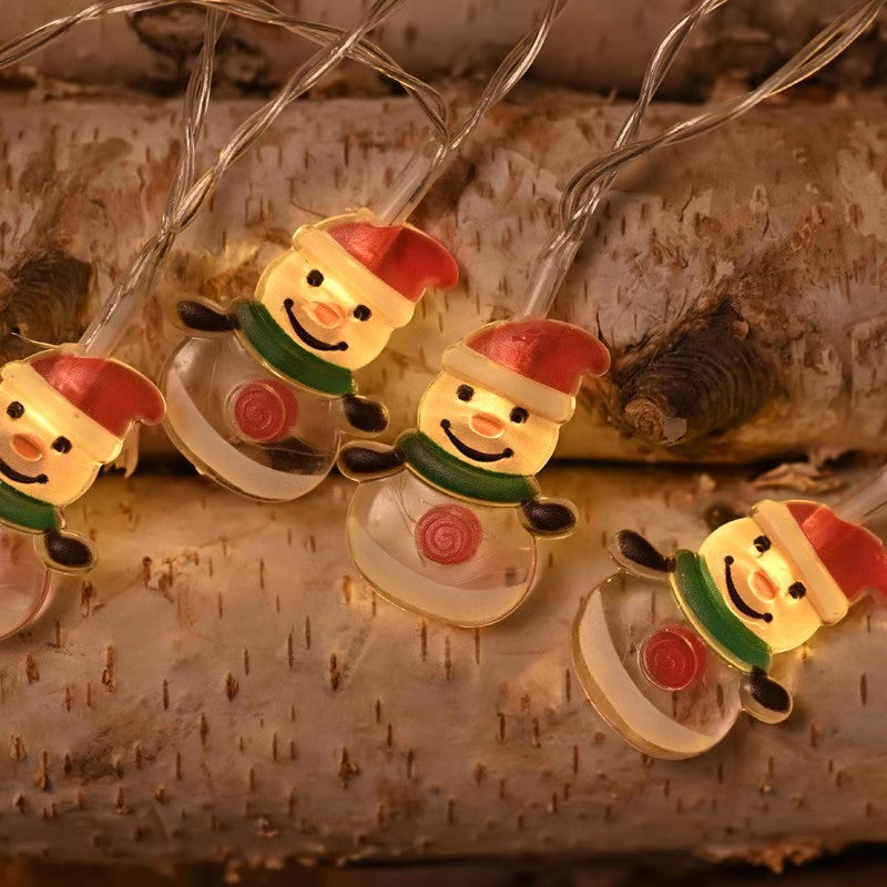 Warm yellow LED string lights with glowing nutcracker Santa-style character bulbs