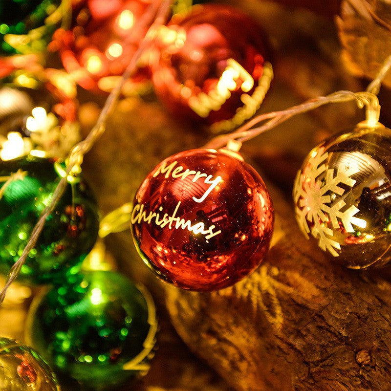 Festive LED string lights with glowing red Christmas baubles and “Merry Christmas” text