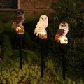 Set of 3 hand-painted owl solar garden stake lights with glowing bases, mixed colors