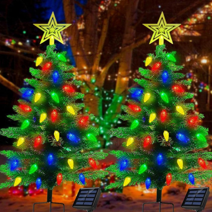 Two pre-lit solar Christmas tree stakes with multicolor LED lights and star topper