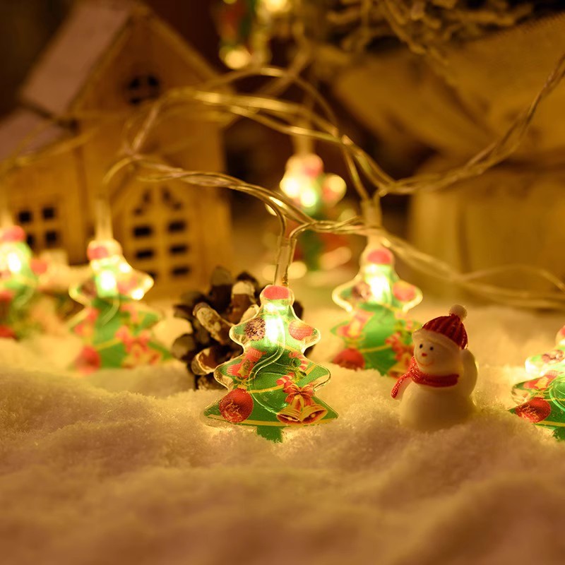 Festive LED light string with glowing Christmas tree and snowman character ornaments