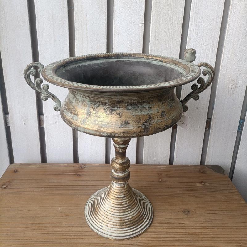 Distressed gold planter urn bowl on pedestal base with scroll-style side handles