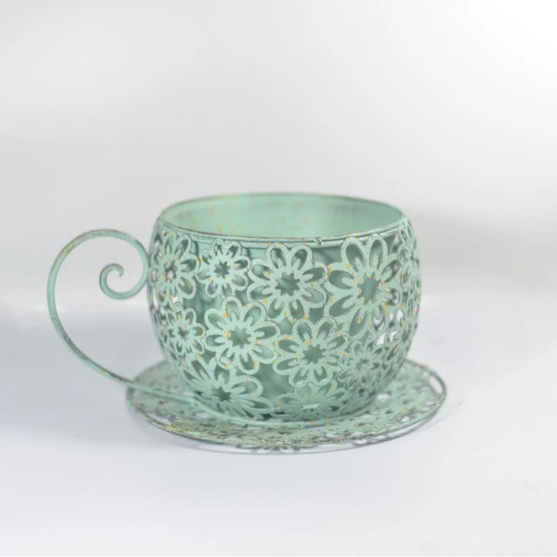 Vintage Floral Cutout Metal Teacup Planter – Rustic Iron Cachepot with Saucer Base & Scrolled Handle (11" Wide) - The Curated Shop