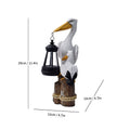 Mother & Baby Pelicans with Lantern
