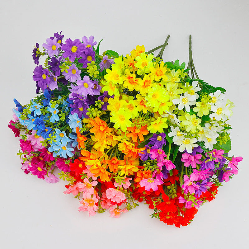 Colorful faux daisy flower stems bouquet with purple, yellow, orange, pink, and blue blooms