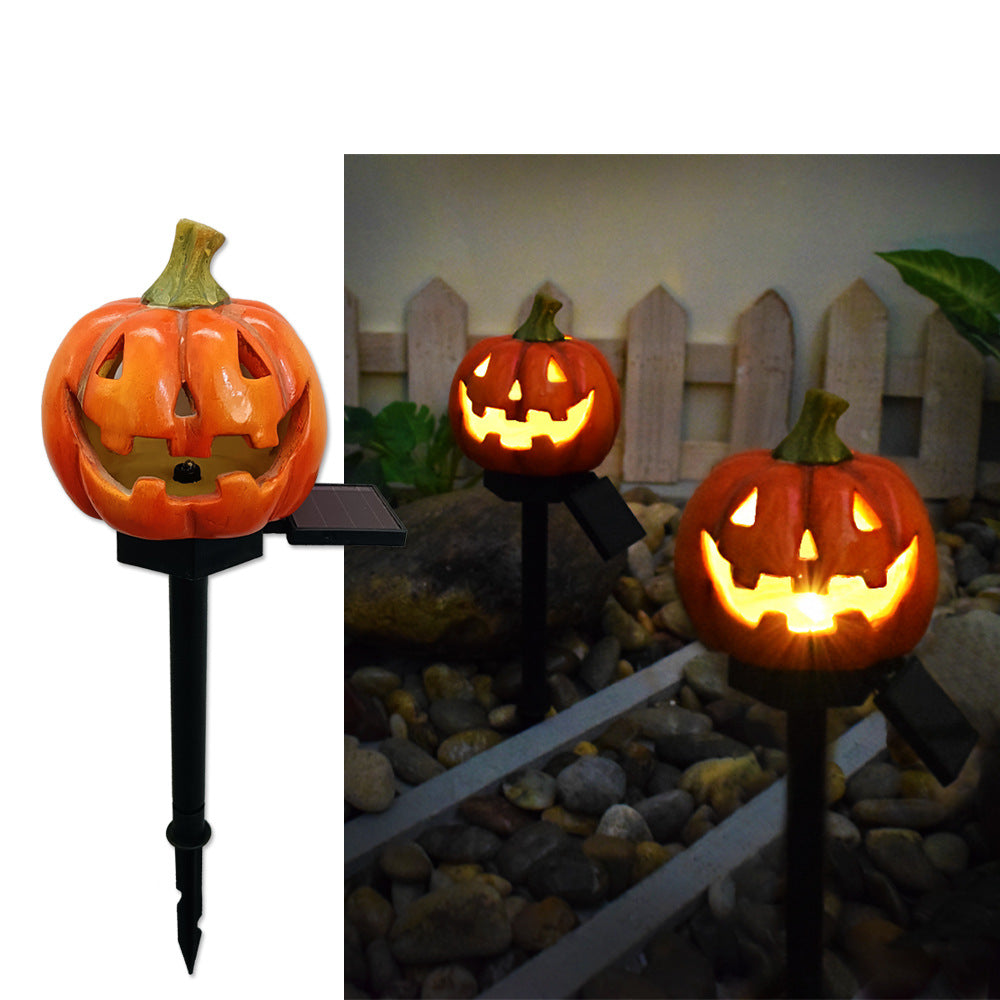 2-pack solcellsdrivna Halloween-gångbelysning med orange snidade pumpa-ansikten