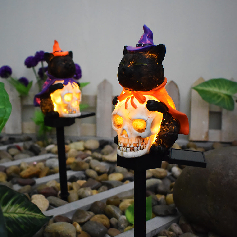 Glödande svart katt och jack-o-lantern-skalle solcellslampor för trädgårdsstång
