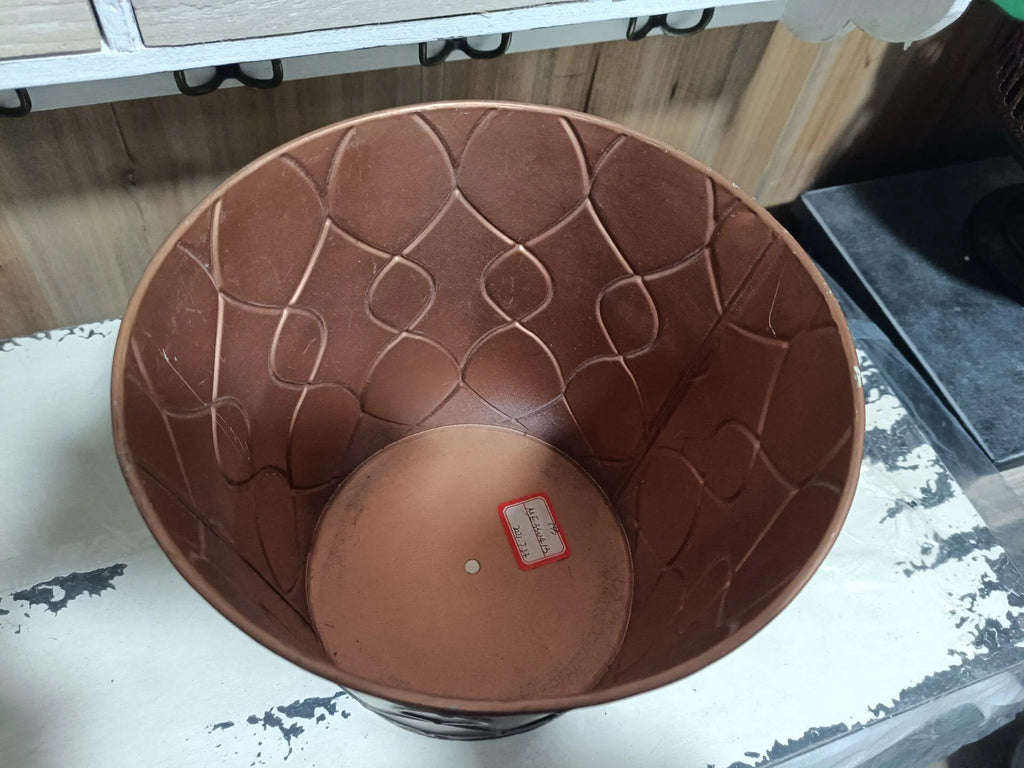 Brown iron planter bucket with embossed diamond pattern, open top view