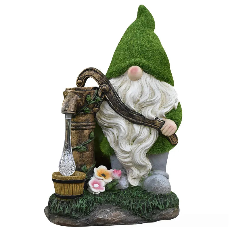 Resin gnome in green hat holding a bronze lantern and flowers