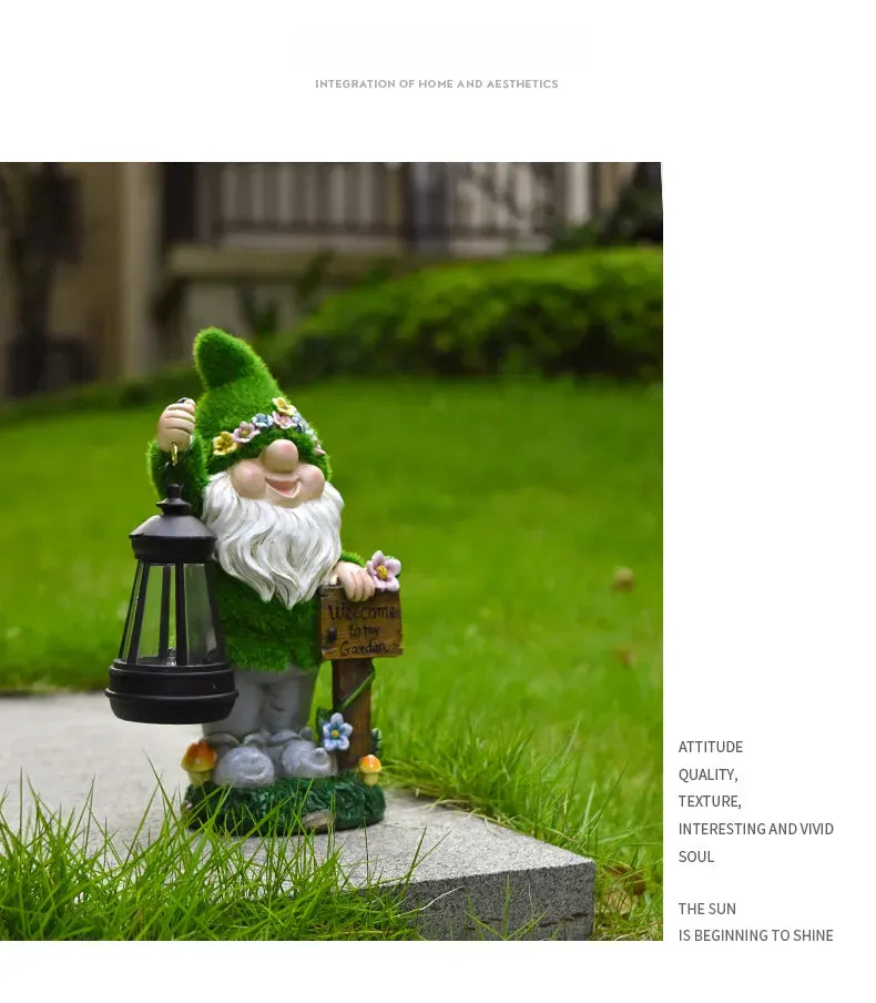 Resin gnome holding a glowing LED black lantern beside a flowered welcome plaque.