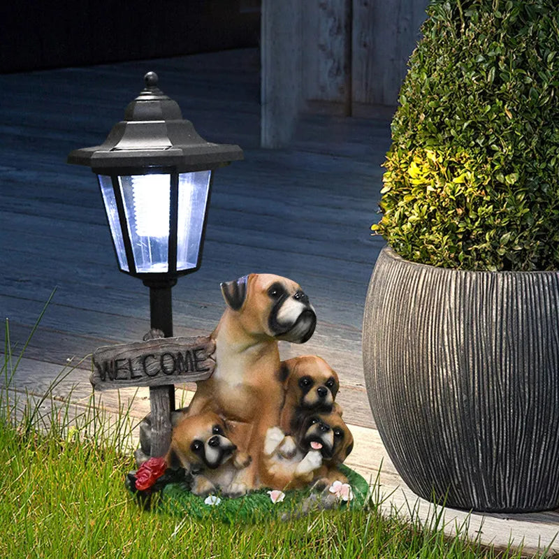 Solar dog garden statue with LED lantern, three puppies on grass with Welcome plaque