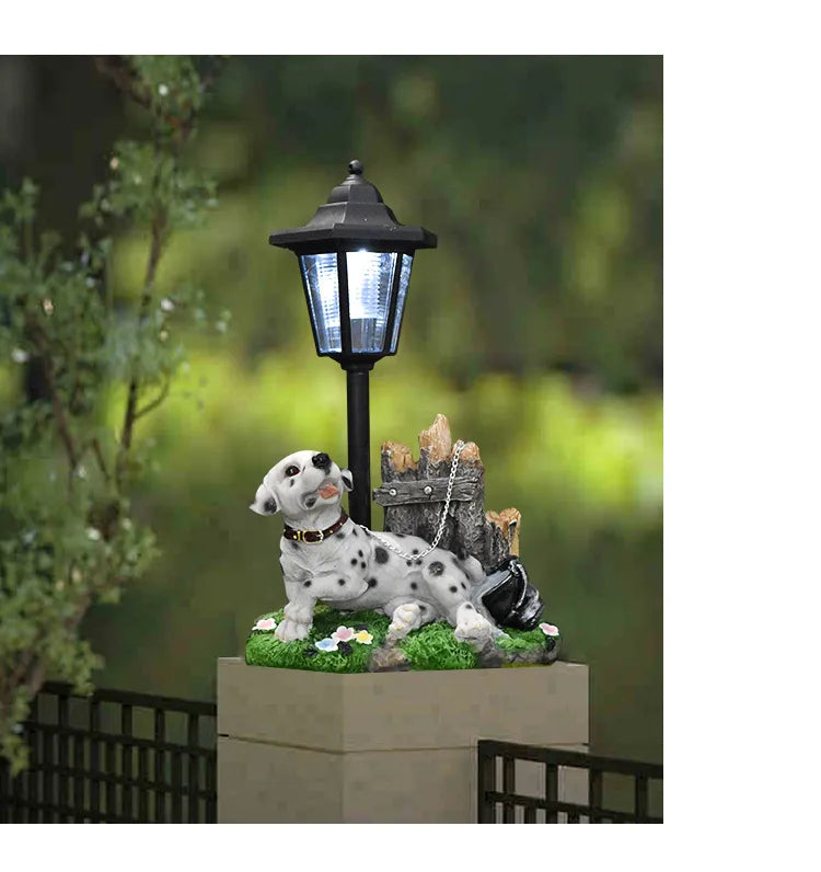 Solar dog garden statue with LED lantern, white spotted puppies on stone planter
