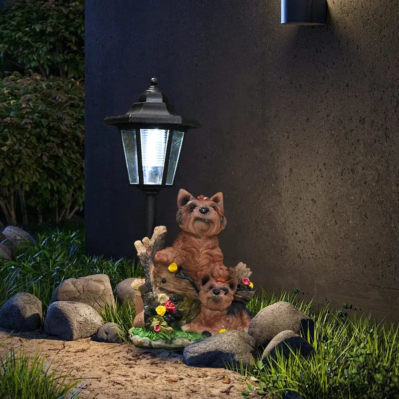 Solar dog garden statue with LED lantern, brown dog with small puppies among flowers