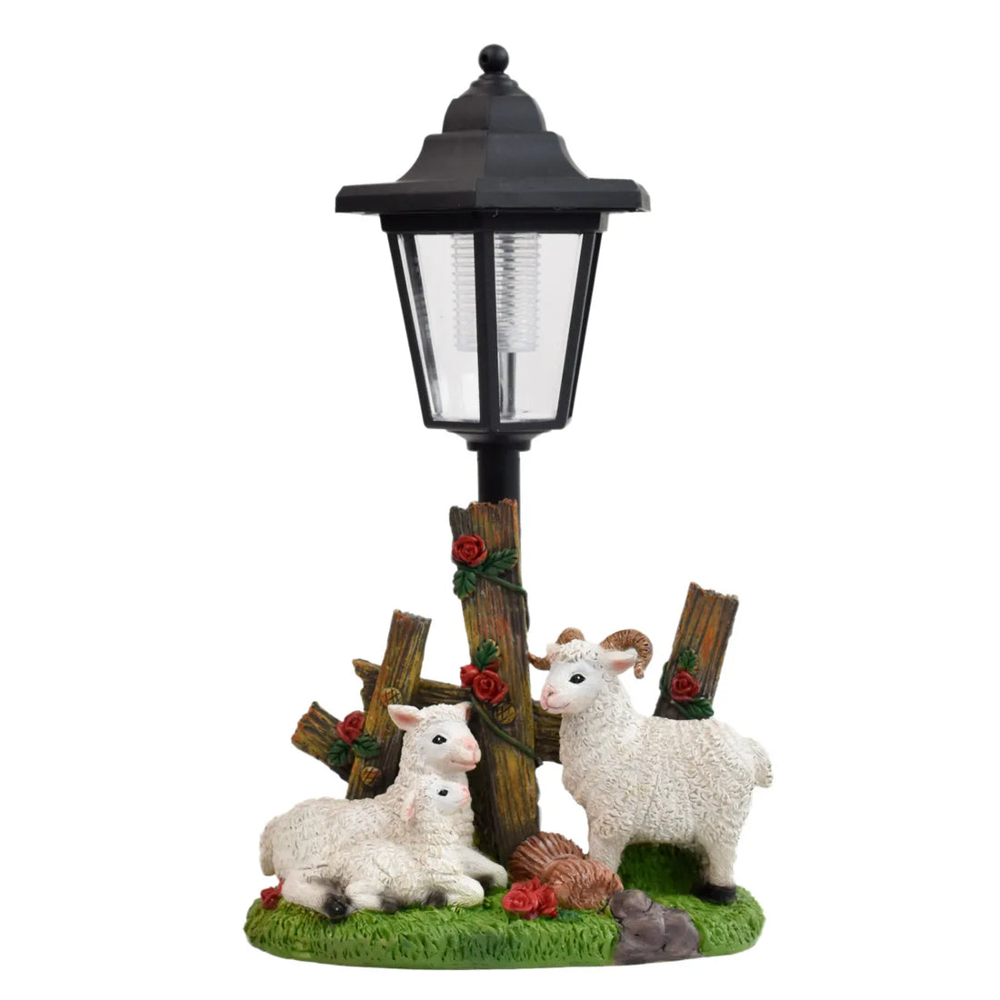 Solar LED garden statue with black lantern and two white lamb figures on grass