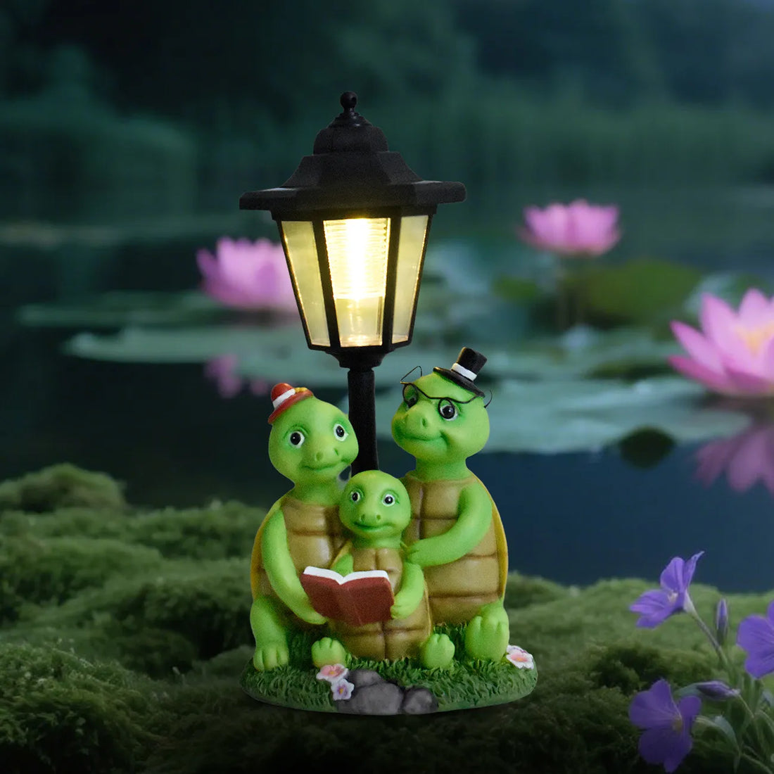 Hand-painted resin frog family garden statue with glowing LED lantern on base