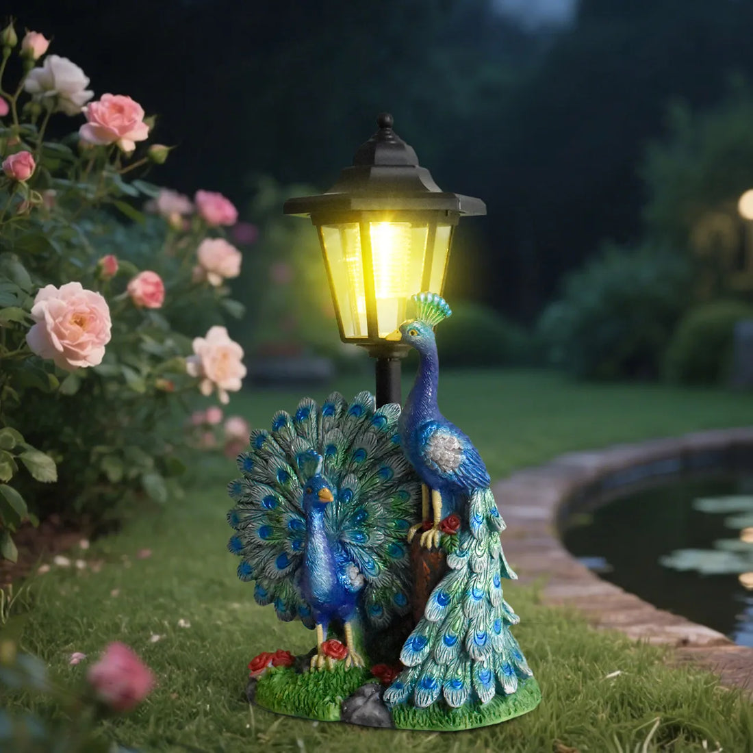 Peacock garden resin statue with glowing LED lantern, blue feather details