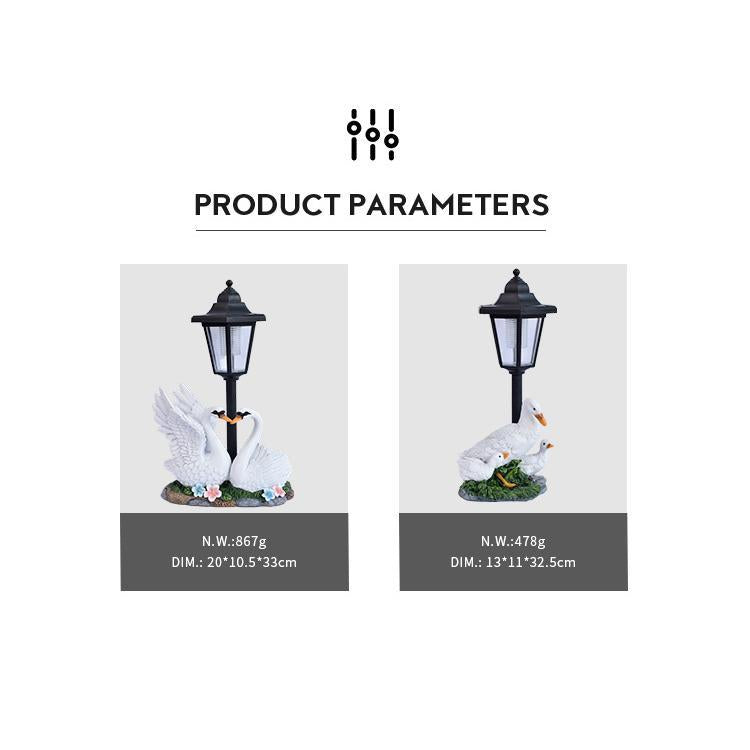 Two decorative goose statues with lamps on a white background, showing product parameters.