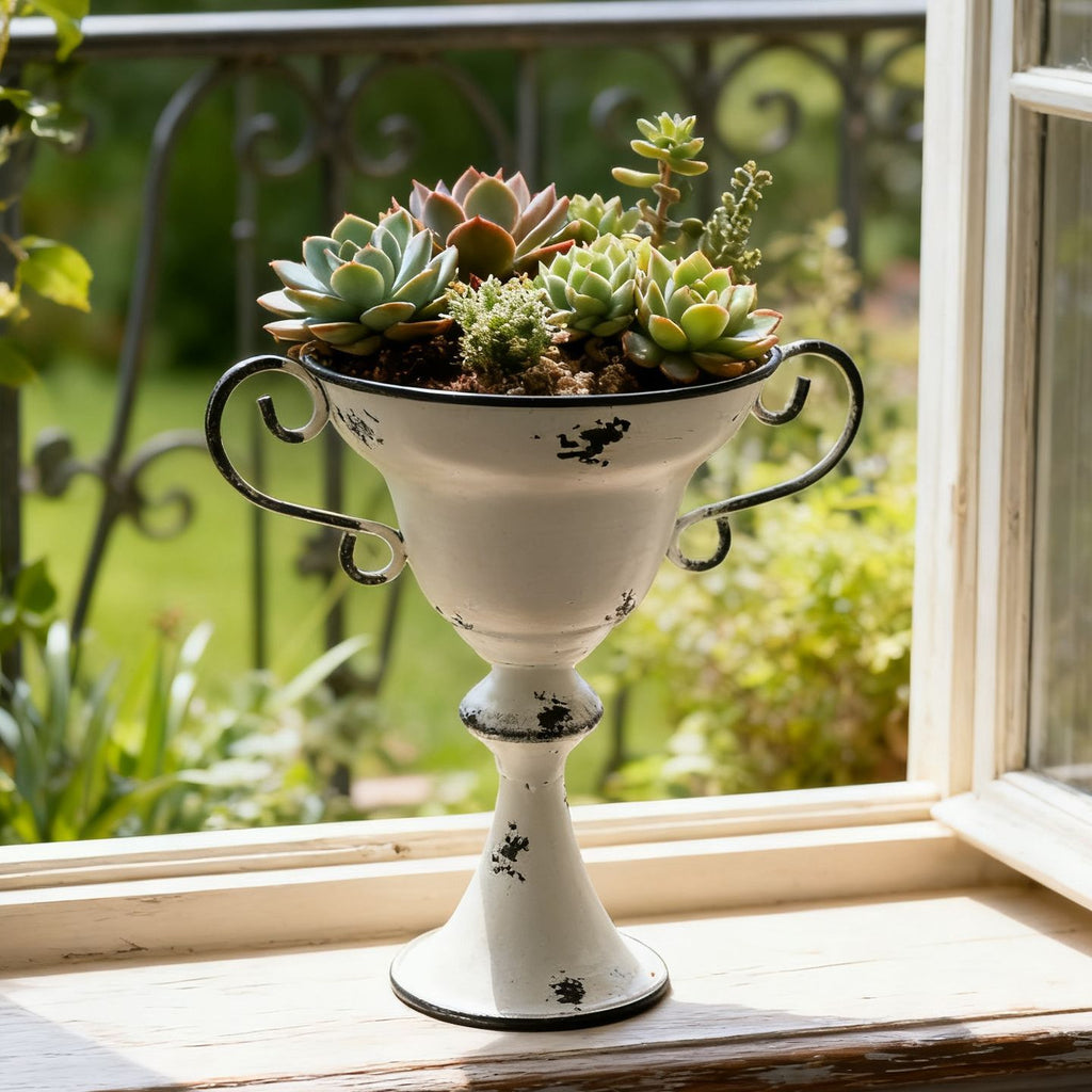 Bring the timeless, romantic elegance of a Provence countryside estate to your home with this striking Tall Trophy Planter