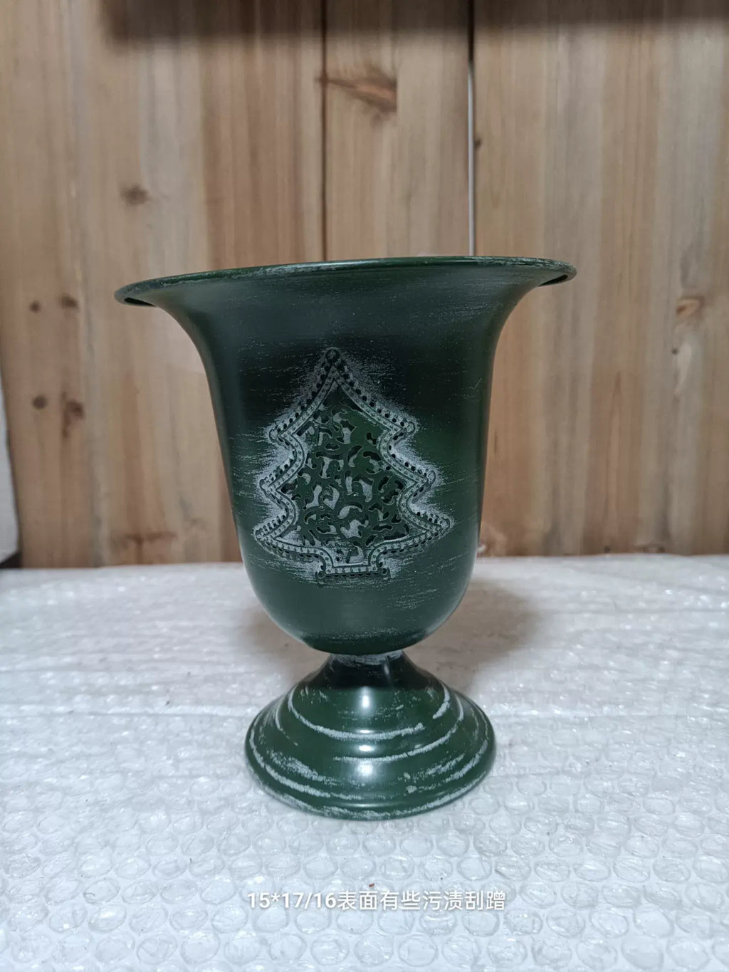 Vintage Green Holiday Pedestal Planter – Distressed Metal Urn with Christmas Tree Relief & Gold Interior (6.7" Tall)