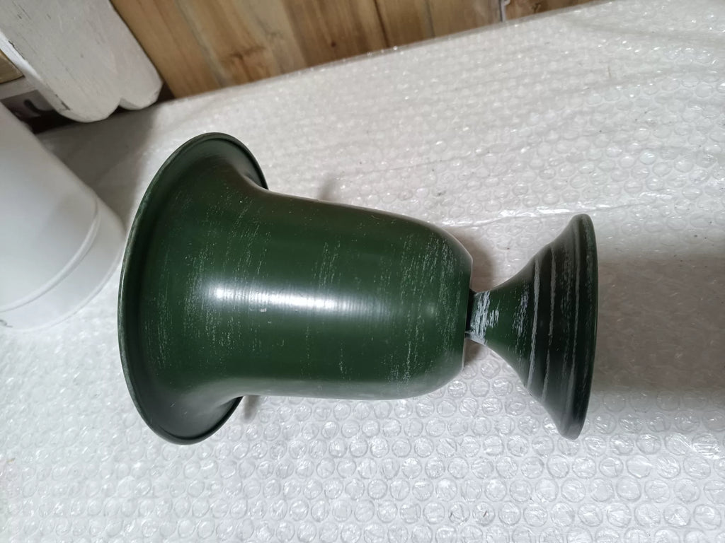 Vintage Green Holiday Pedestal Planter – Distressed Metal Urn with Christmas Tree Relief & Gold Interior (6.7" Tall)