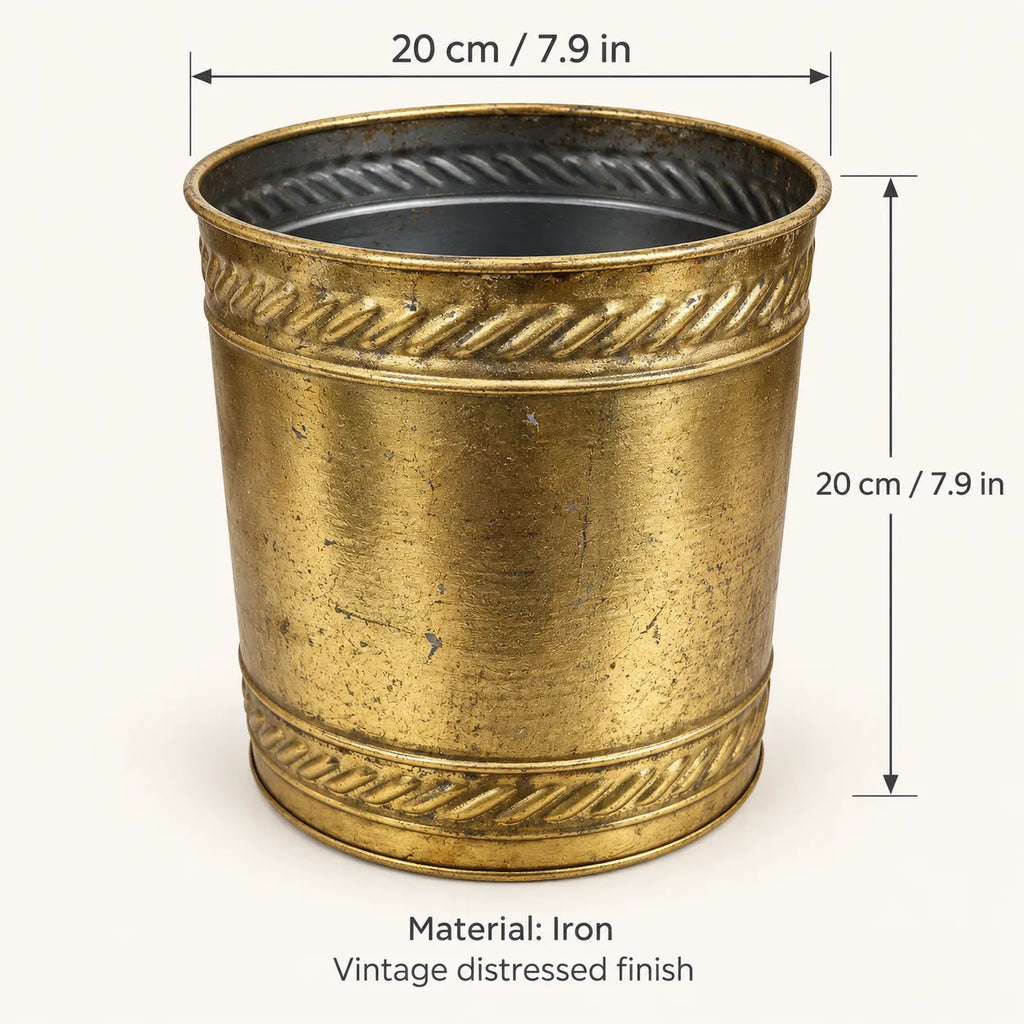 Antique gold iron cachepot planter with vintage distressed finish and patterned top rim