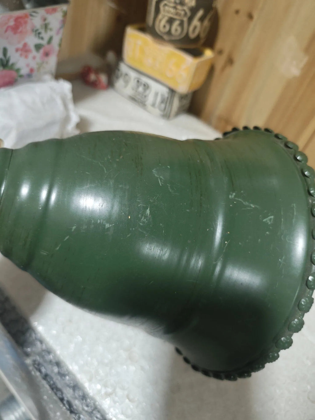 Vintage green iron hanging bell with scalloped rim and chain link top