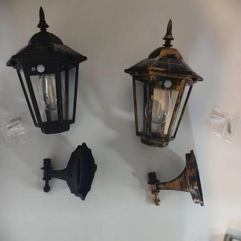 Solar wall lantern pair plus mounting bracket pieces in black and bronze colors